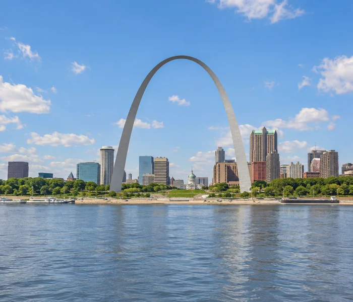 The Gateway Arch and St. Louis skyline beside the Mississippi River.